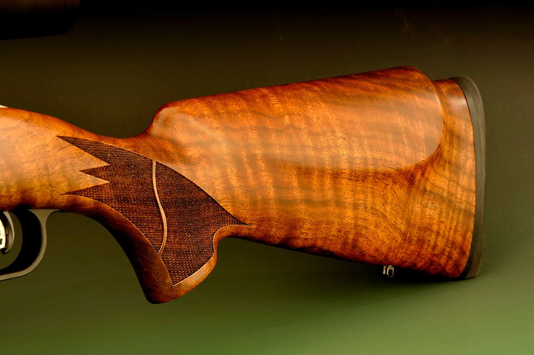 Shaw rates all of their walnut stocks as Grade 5 and this is a perfect example of what they have in stock with a fiddleback pattern to boot. The cheekpiece is standard as is the Pachmayr recoil pad.